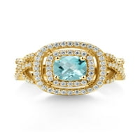 Gem Stone King 18K žuti pozlaćeni srebrni nebo plavi topaz i bijeli moissanitni prsten za žene