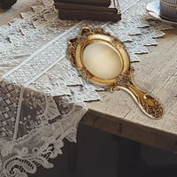 Vintage ručno ogledalo ovalna reljefna cvjetna antikva kozmetička ručka alata