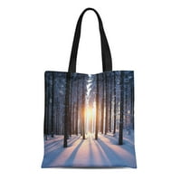 Platno torba snijeg zalazak sunca u šumi između drveća sojeva zimsku trajnu torba za prehrambenu toku