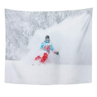 Plava skijaška skijaška se vozi nizbrdo u dubokom zidnom umjetnosti Viseća tapiserija za tapiseriju